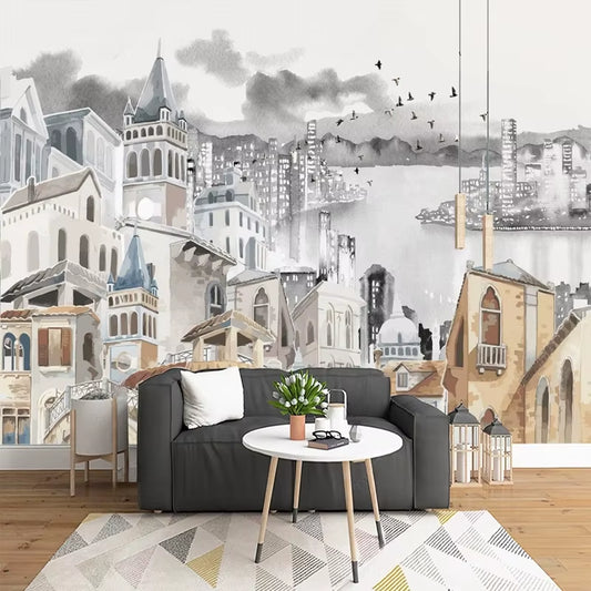 Papier peint panoramique Entre deux rives dans un salon, canapé anthracite et guéridon blanc fleuri